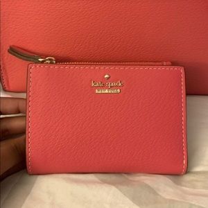 Kate spade abri wallet In flamingo pink.